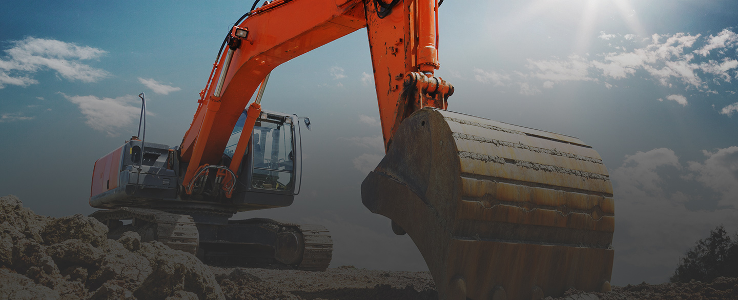 excavator parked in a construction zone Missoula MT